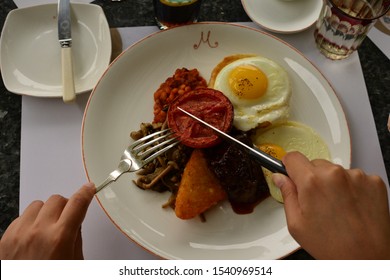 Shanghai, China - September 14, 2019: Just About To Have A Breakfast In Restaurant. Full English Breakfast With Bacon, Sausage, Fried Egg, Baked Beans And Mushrooms.