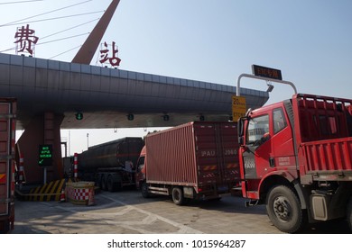 SHANGHAI, CHINA-JAN 08, 2018:  Trucks Line Up At The Toll Both Of A Highway In Shanghai, China.