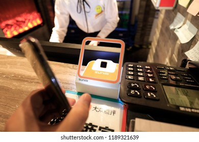 SHANGHAI CHINA-September 26, 2018: Customers Shop In A Shopping Mall Using Alipay Mobile Wallet, WeChat Payment And Supermarket Sweep Code Gun. Becomes Very Common And Popular In China,fast And Safe.