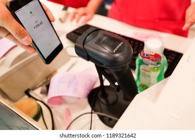 SHANGHAI CHINA-September 26, 2018: Customers Shop In A Shopping Mall Using Alipay Mobile Wallet, WeChat Payment And Supermarket Sweep Code Gun. Becomes Very Common And Popular In China,fast And Safe.