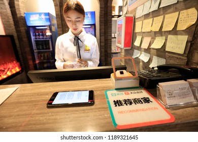 SHANGHAI CHINA-September 26, 2018: Customers Shop In A Shopping Mall Using Alipay Mobile Wallet, WeChat Payment And Supermarket Sweep Code Gun. Becomes Very Common And Popular In China,fast And Safe.