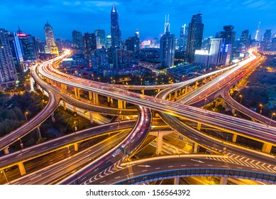 SHANGHAI - CIRCA APRIL 2013 - Night Skyline View Of City And Highways With Flowing Traffic, Circa April 2013