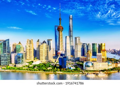 Shanghai City Skyline With Huangpu River. Pudong Business District In Shanghai, China With Blue Sky During Summer Sunny Day