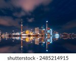 Shanghai cityscape reflection at night on the Bund