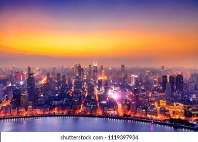 Shanghai cityscape sunset twilight with smog lies over the skyline of Historical architecture and modern skyscraper on the bund of Shanghai, China  - Shutterstock ID 1119397934