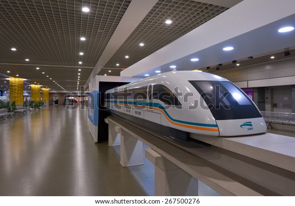 SHANGHAI, CN - MAR\
15 2015:Scale model of Shanghai Maglev train in Shanghai airport.\
The line is the first commercially operated high-speed magnetic\
levitation line in the\
world