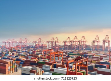 Shanghai Container Terminal At Dusk, One Of The Busiest Ports In The World