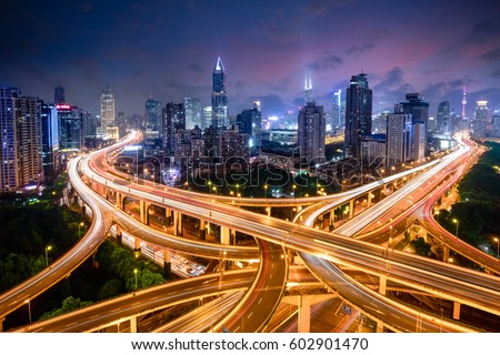 Shanghai elevated road junction and interchange overpass at night, Shanghai China