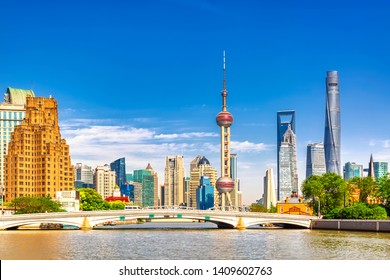 Shanghai Pudong Skyline With Historical Waibaidu Bridge, China During Summer Sunny Day