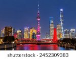 Shanghai skyline at Bund with Oriental Pearl Tower downtown at twilight night in China