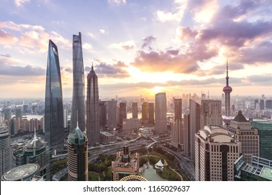 Shanghai Skyline And Cityscape At Sunset