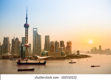 Shanghai Skyline And Huangpu River At Dusk