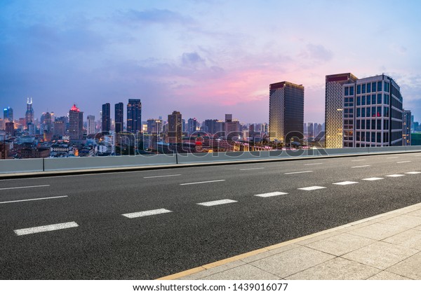 Shanghai skyline panoramic view with asphalt
highway at sunset