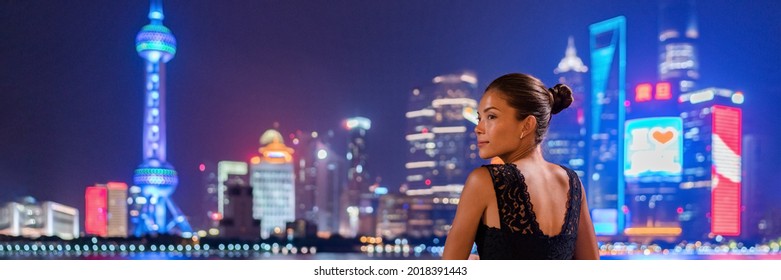 Shanghai Woman Travel China Luxury Lifestyle Of The Rich Chinese Millionaires. Asian Elegant Lady Going Out In City Nightlife Looking At Skyline Vew Panoramic Landscape.