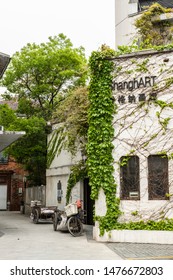 SHANGHAI/CHINA - April 14, 2019: Exterior Of ShangART Contemporary Art Gallery In M50 Arts District With Bicycle Outside. 