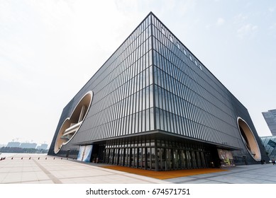 SHANGHAI,CHINA - MARCH 11, 2017: Day Scene Of Shanghai Poly Grand Theatre, Shanghai Poly Grand Theatre Is Theatre Designed By Tadao Ando.