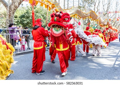 Shanghai,China - on February 11,2017:Dragon and lion parade dance show in the Chinese Lantern Festival.