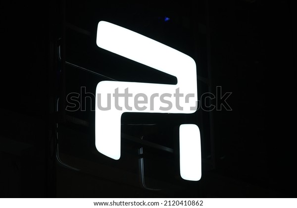 Shanghai.China-Feb.8th 2022:\
close up brand logo of R Auto. R Auto is a Chinese electric car\
brand by SAIC\
Motor