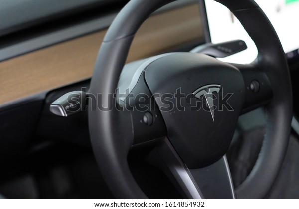 Shanghai,China-Jan.2020: close up Tesla\'s brand logo on\
steering wheel.\
