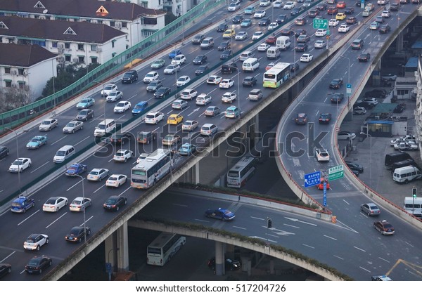 SHANGHAI-March 12, 2016:a large number of cars\
through the viaduct. Chinese car ownership rapid growth of motor\
vehicles has reached 285 million, is the world\'s first production\
and marketing\
power.