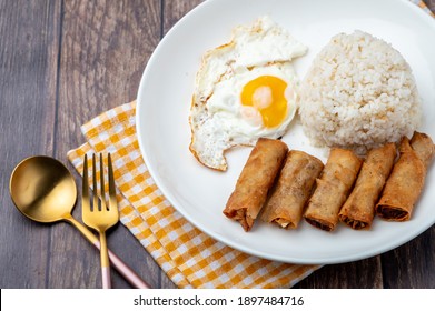 Shanghaisilog  (top Shot)- Is A Famous Filipino Meal That Consists Of Fried Rice, Egg And Spring Rolls.