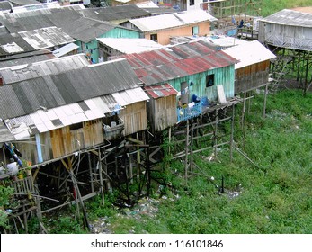 Shanty town in Manaus Amazonia, Brazil - A favela is a specifically portuguese word for a shanty town. The Wooden houses built on high stilts called Palafitas. Photo taken 02/22/2003