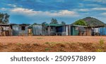 shanty town , shack made of corrugated sheet galvanized metal, township informal settlement,