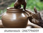 To shape the clay, the potter makes use of a wheel. India, specifically in Telangana and Andra Pradesh