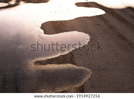 shape formed by the puddle