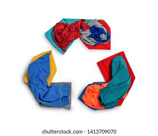 Shape of recycle symbol from fabric scraps, old clothing and textiles - Shutterstock ID 1413709070