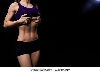 Shaped Abdominal And Slim Waist Concept. Fitness Woman Showing Abs And Flat Belly. Beautiful Muscular Girl.