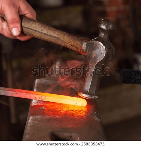 Similar – Image, Stock Photo Artisan blacksmith forging metal by fiery forge