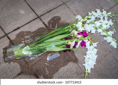 Shards Of A Broken Vase On The Floor