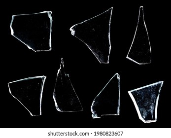 shards of glass isolated on a black background. High quality photo