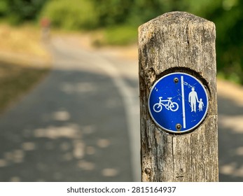Shared Cycle and Pedestrian Path Sign on Wooden Post