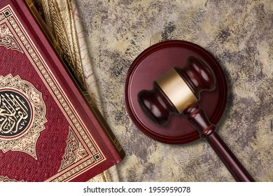 Sharia Or Islamic Law Concept With Gavel And Quran Book On Wooden Desk.