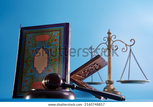 sharia law concept , gavel hammer libra scale and\
holly koran                   \
