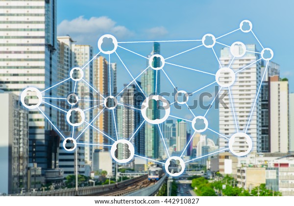 The sharing economy concept.\
Wireless connection against city infrastructure\
background.