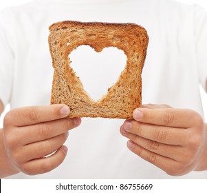 Sharing Food With Love - Kid Hands Holding Slice Of Bread