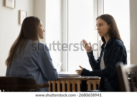Sharing problem on consultation. Young woman client visit trusted professional finance advisor real estate agent lawyer at agency office speak about challenge describe issue ask for advice assistance