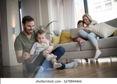 Sharing tender family moments. Family at home. Focus on foreground. - Shutterstock ID 1670844466