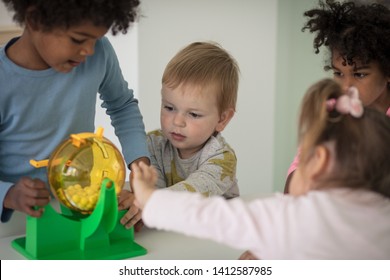 Sharing toy. Children in preschool.