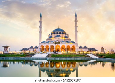 Sharjah New Mosque Largest mosque in Dubai, traditional Islamic architecture Design, famous travel  and Tourist spot in Middle East, Ramadan Kareem image, Beautiful mosque image during sunset - Powered by Shutterstock