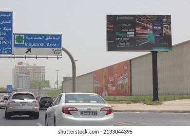 Sharjah, United Arab Emirates - March 7, 2022: Large Outdoor Advertising Display (unipole Billboard) Located On A Major Highway In Sharjah City. Out Of Home Advertising Concept.