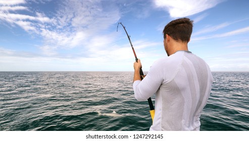 Shark Fishing Activity On Fisherman Boat In Florida. Travel Tourist Man Catch And Release Of Spinner Shark.