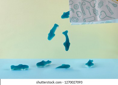 Shark Gummies Coming Out Of A Paper Bag
