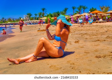 Sharm El Sheikh, Egypt, July 22 2021: A Woman At Beach During Summer Day In Sharm El Sheikh, Egypt.