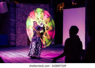 Sharm El Sheikh, Egypt, May 11, 2019: Egyptian man performing tanoura folk dance or sufi whirling