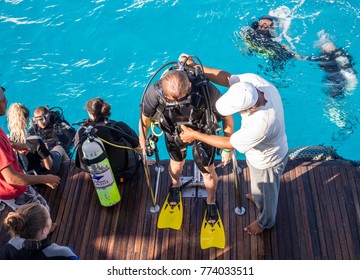Sharm El Sheikh, Sinai / Egypt - December 01 2016: Diving In Egypt. Pleasure Tourist Boat And Divers Before Diving. Divers During The Dive. Active Rest