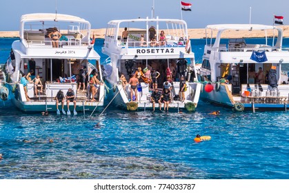 Sharm El Sheikh, Sinai / Egypt - December 01 2016: Diving In Egypt. Pleasure Tourist Boat And Divers Before Diving. Divers During The Dive. Active Rest At The Reef